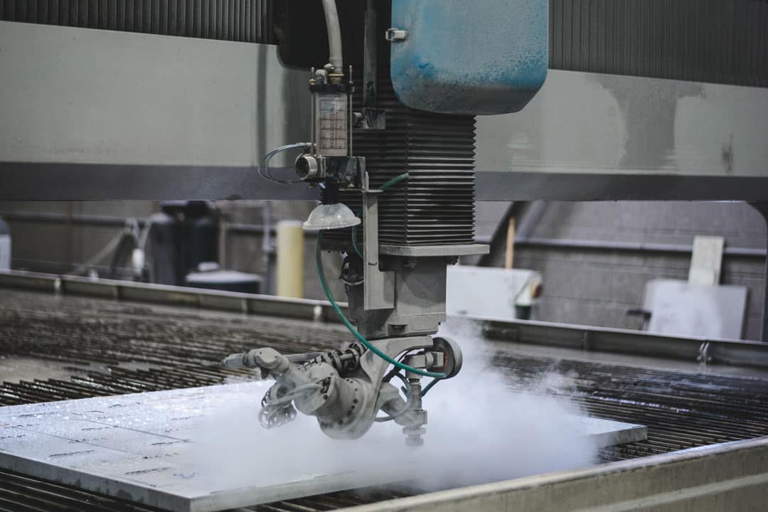 A waterjet cutter cutting a component for large tooling or parts for the oil and gas industry